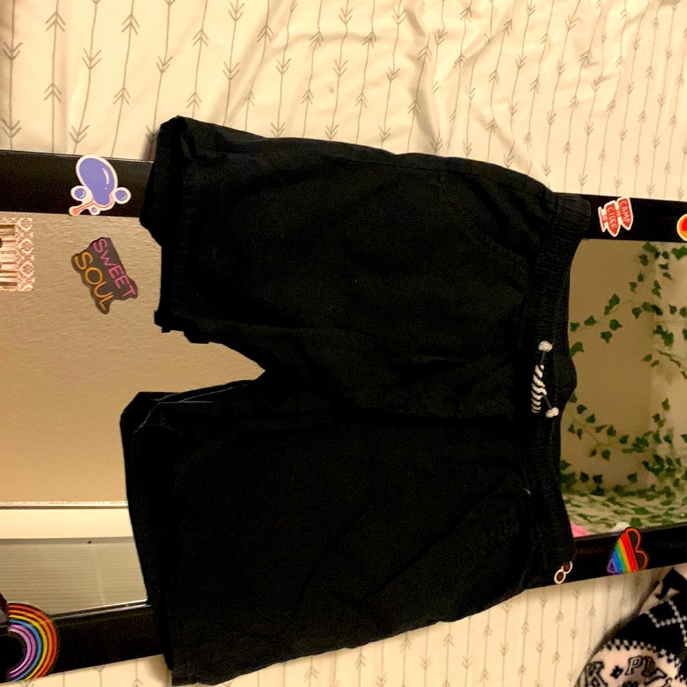 These are Black and white shorts with pockets
